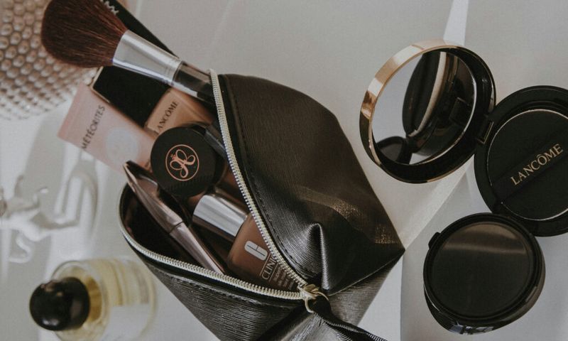 cosmetics in black cosmetics bag