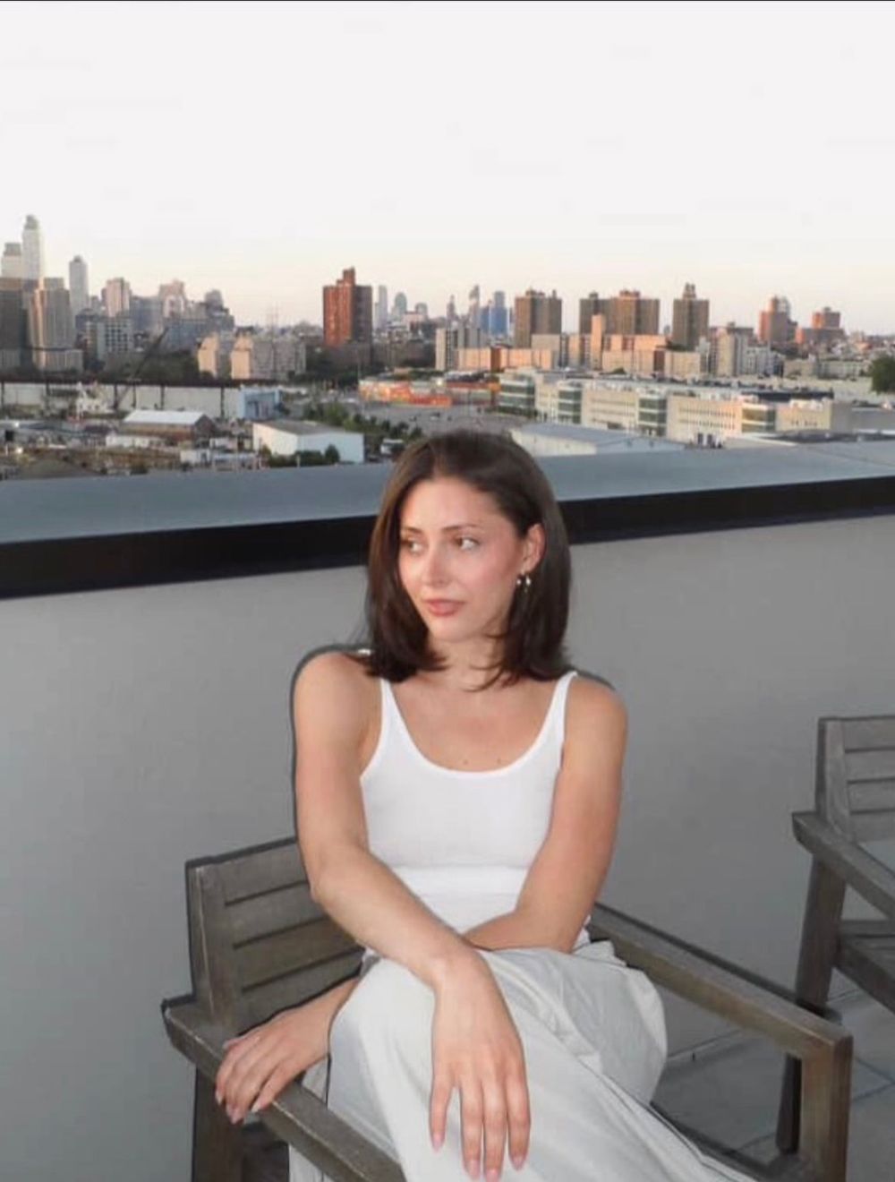 woman with bob haircut sitting outside