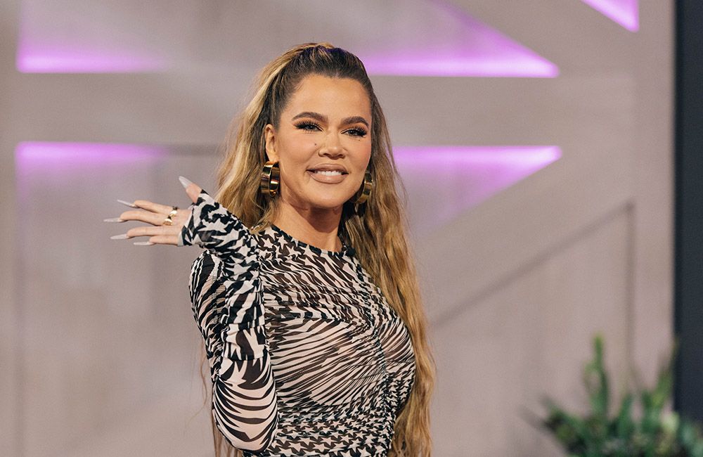 Khloé Kardashian’s Holiday Hair Transformation: Darker Hues and Stunning Extensions