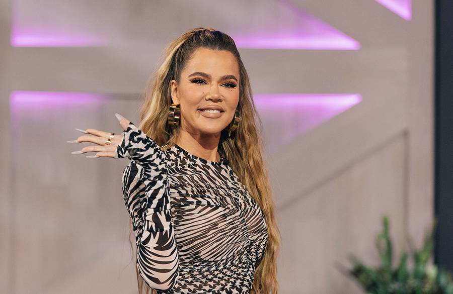 Khloé Kardashian’s Holiday Hair Transformation: Darker Hues and Stunning Extensions