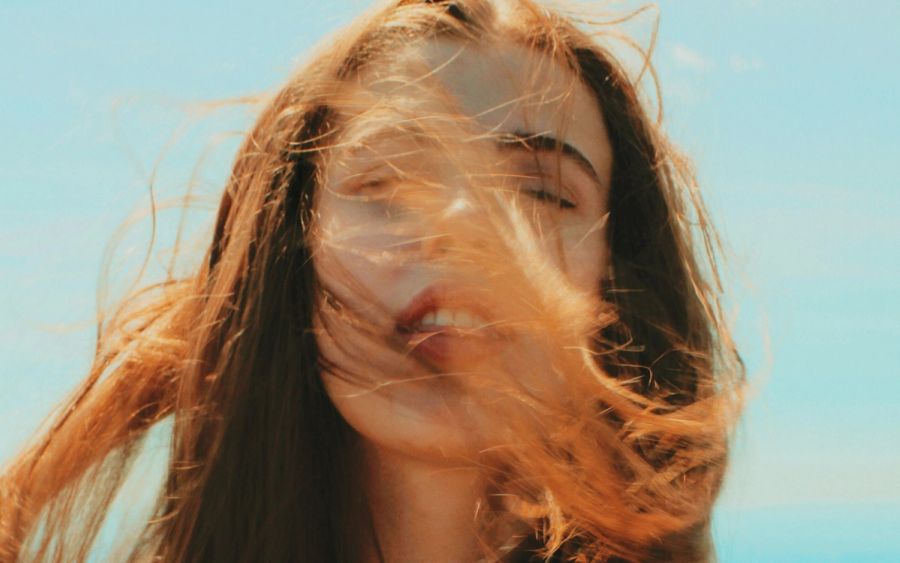 woman with red hair in the wind