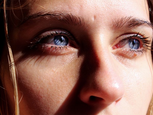 close up of woman's blue eyes
