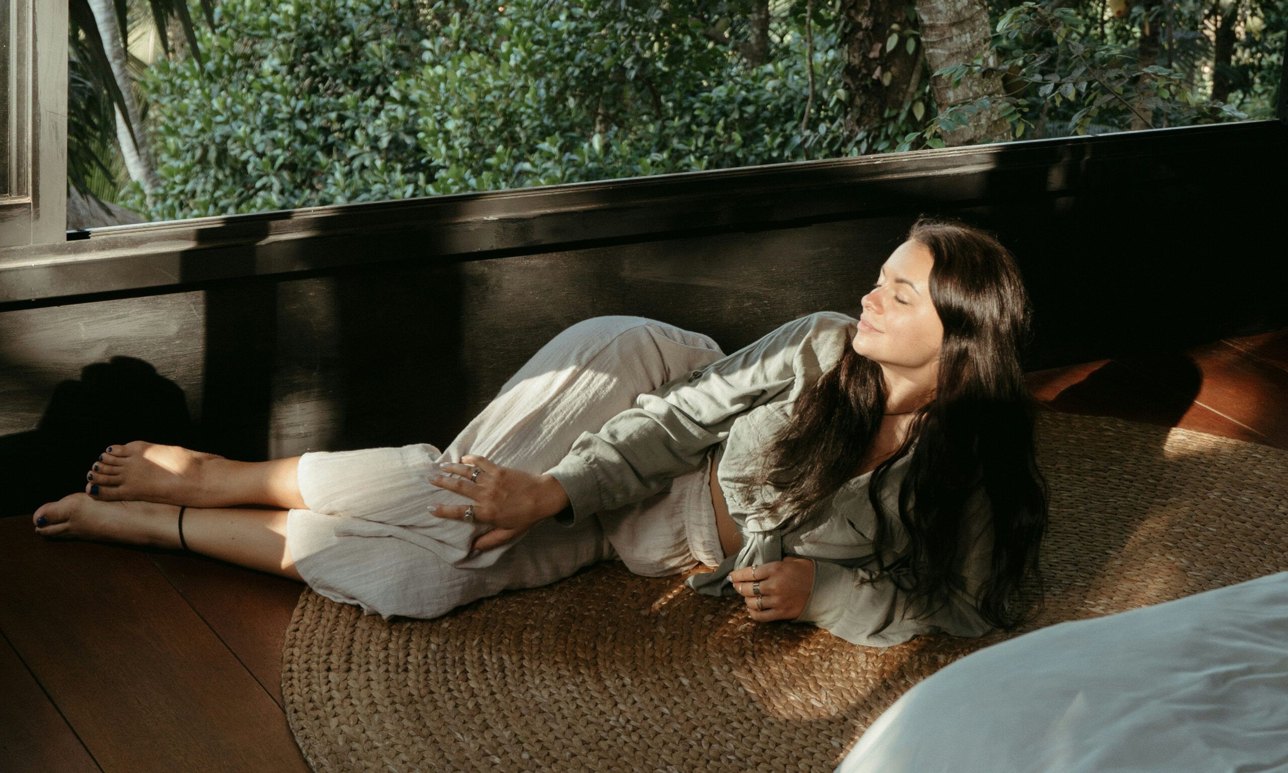woman laying down in outdoor villa