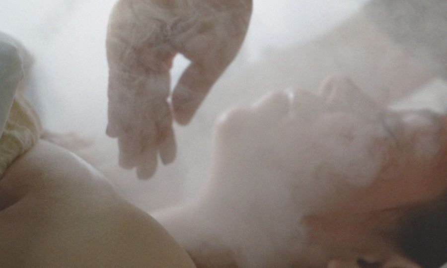 woman getting spa massage treatement