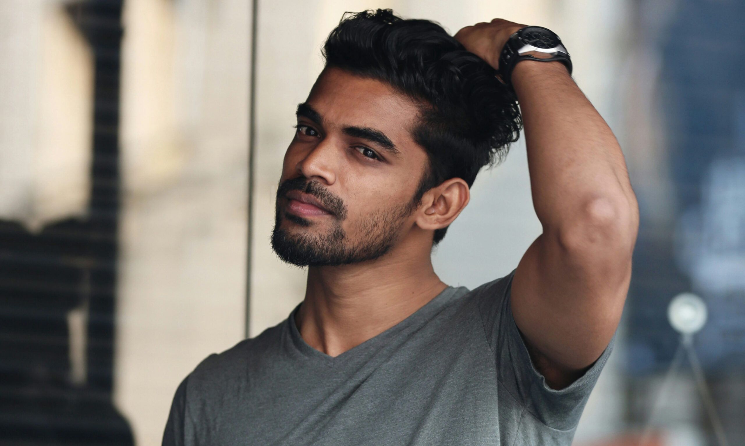 handsome man touching his hair