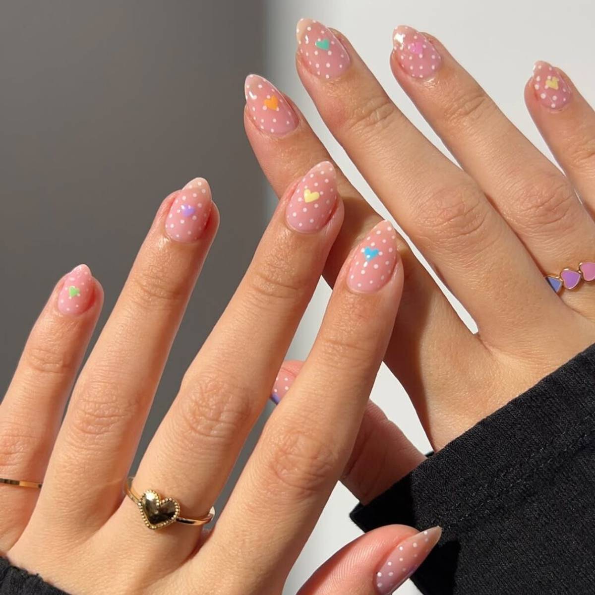 Polka dot decorated nails with tiny hearts