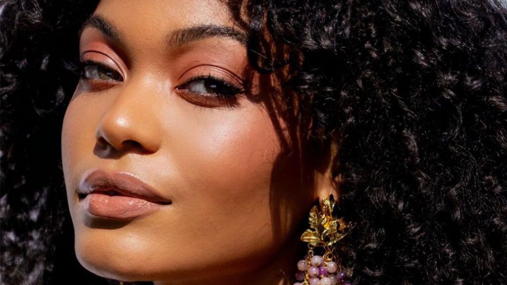 A close-up of model with full coverage makeup look