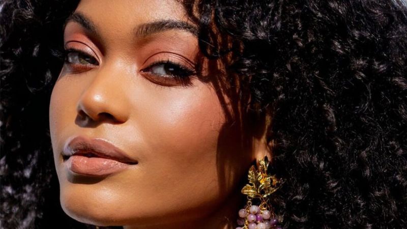 A close-up of model with full coverage makeup look