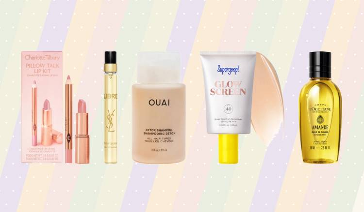 Mini beauty products from Charlotte Tilbury, Yves Saint Laurent, Ouai, Supergoop! and L’Occitane displayed against a pastel striped background.