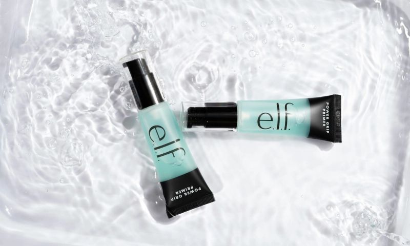 elf cosmetics on water background