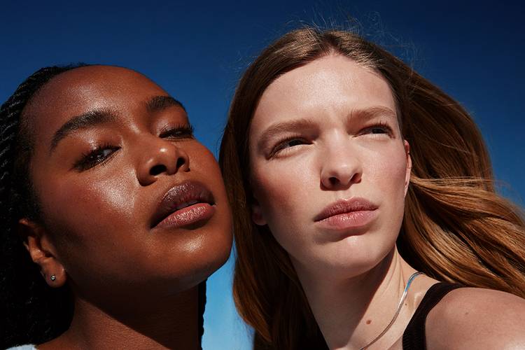 two women in the sun