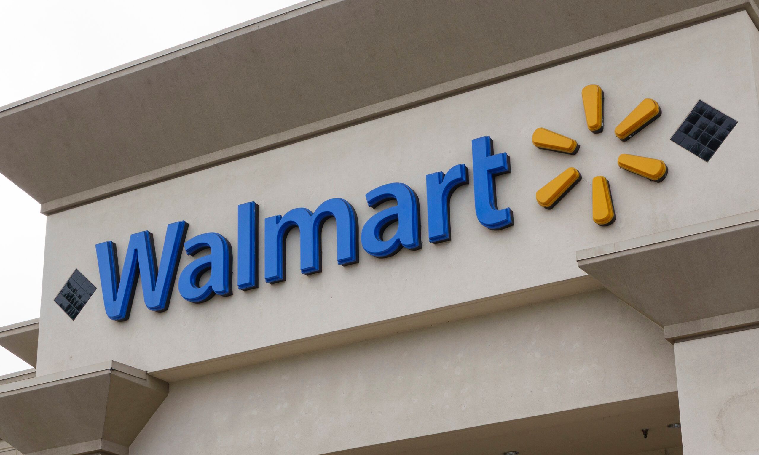 A Walmart logo is displayed outside one of their stores on March 23, 2025 in San Diego, California.