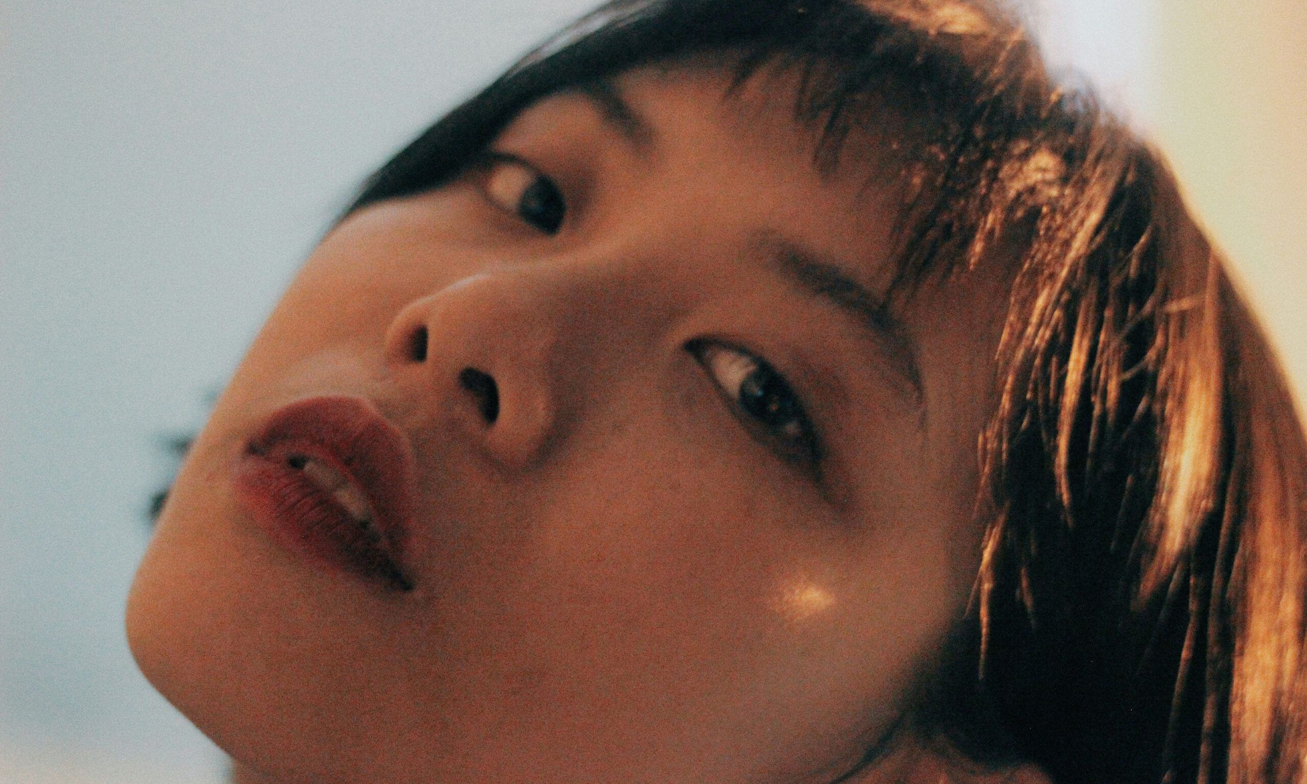 woman with dark brown lip color