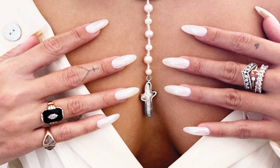 close up of long nails on chest