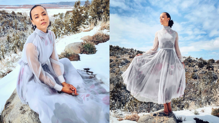 Two photos of Maria Sten in a flowing sheer white dress with a pale floral pattern, seated on a rock in one and standing in a snowy landscape in the other.