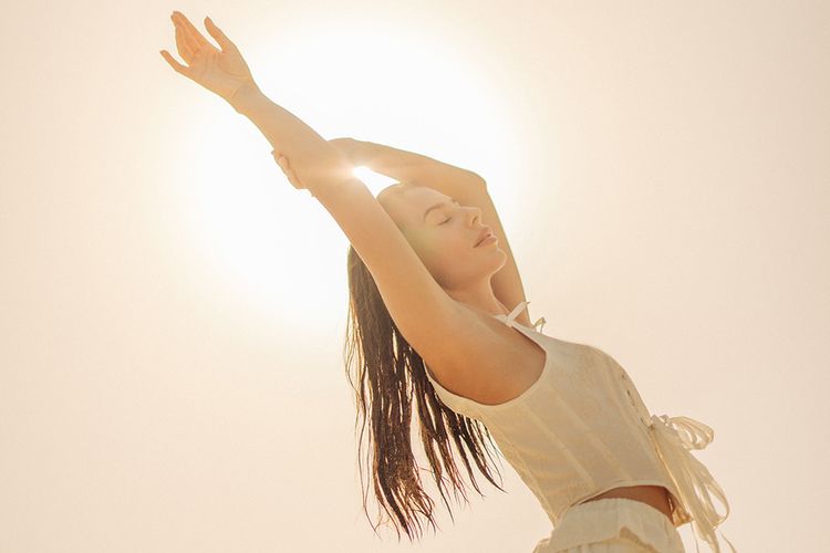 woman with hair in sun