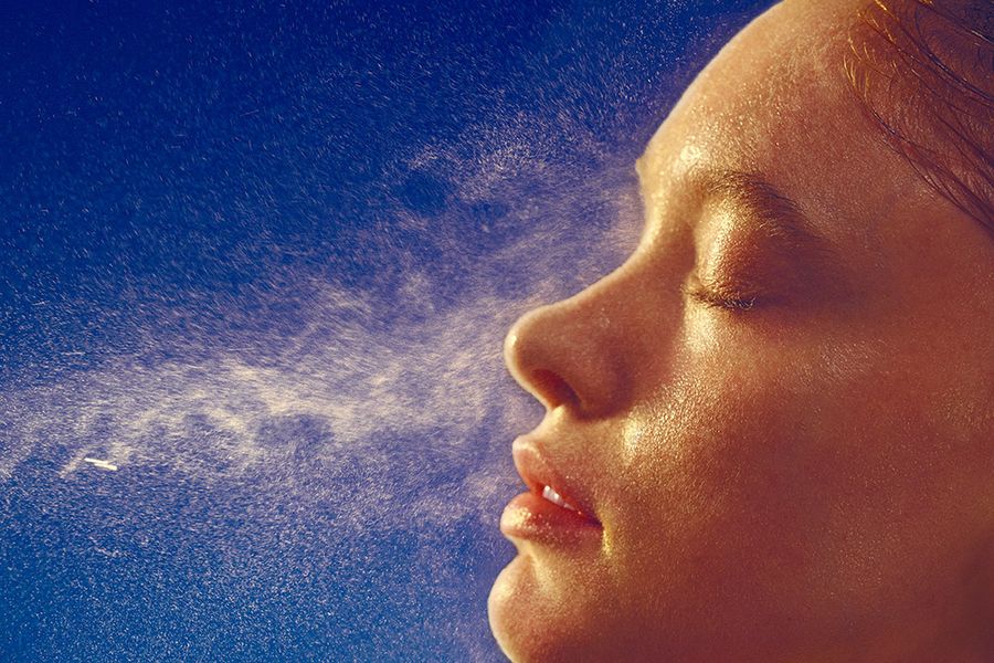 mist on woman's face