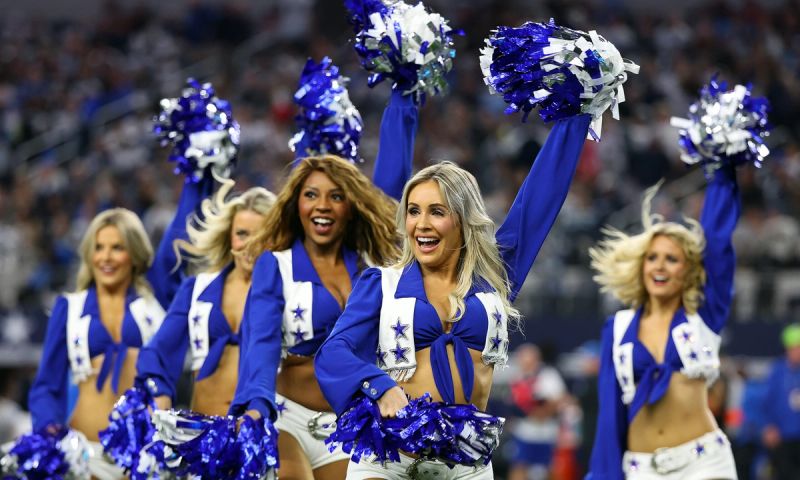 The Dallas Cowboys Cheerleaders perform during the game against the Detroit Lions at AT&amp;T Stadium on December 30, 2023 in Arlington, Texas.