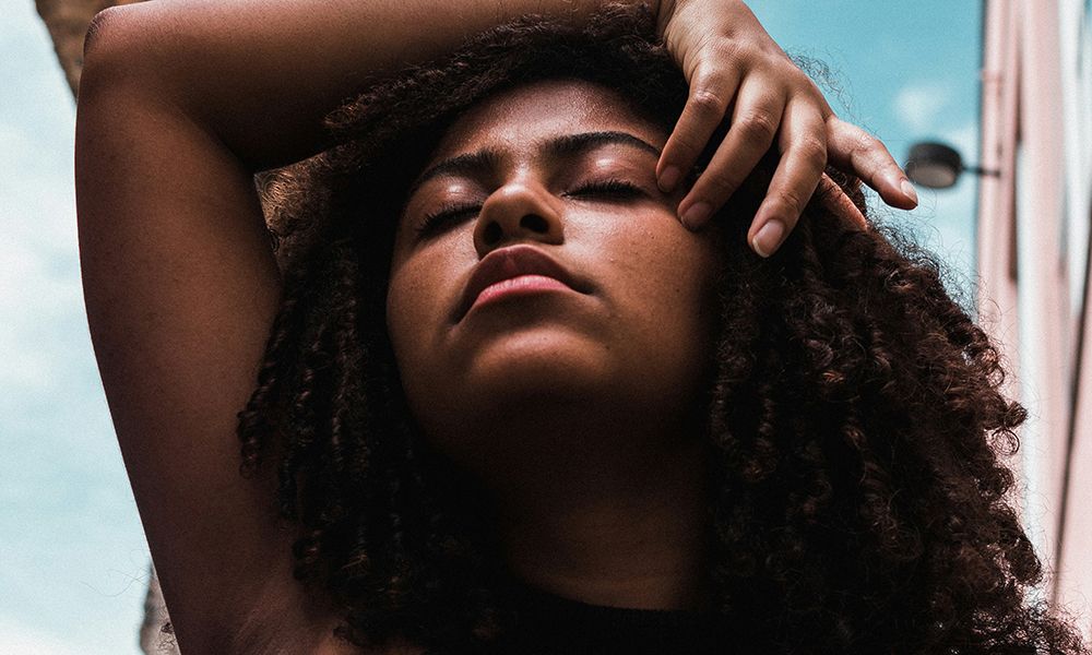 Black woman with natural curly hair
