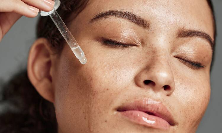 serum on woman's cheek