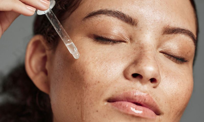 serum on woman's cheek