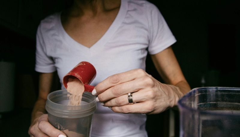 woman with protein powder