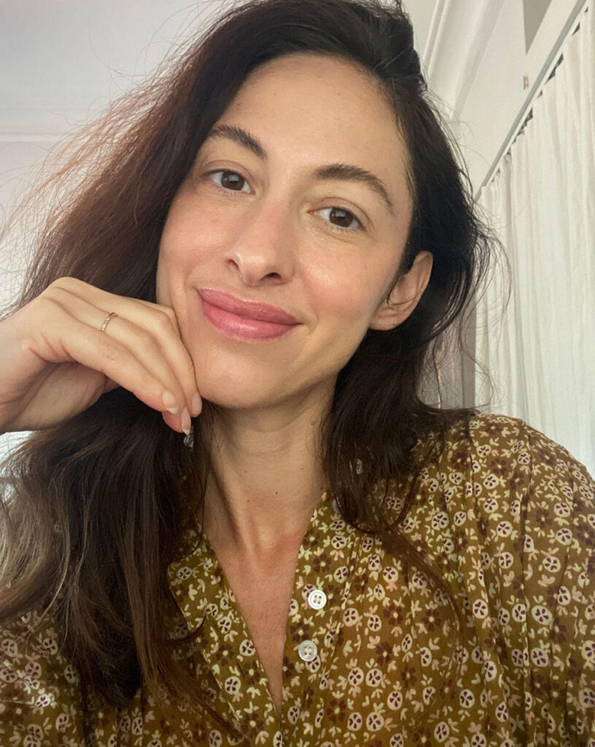 woman with hand on chin portrait