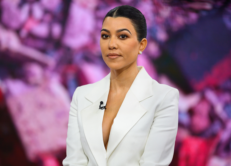Kourtney Kardashian’s Makeup Artist Just Broke Down Her Purple-Glossy Lid Look and the Lineup Is Surprising