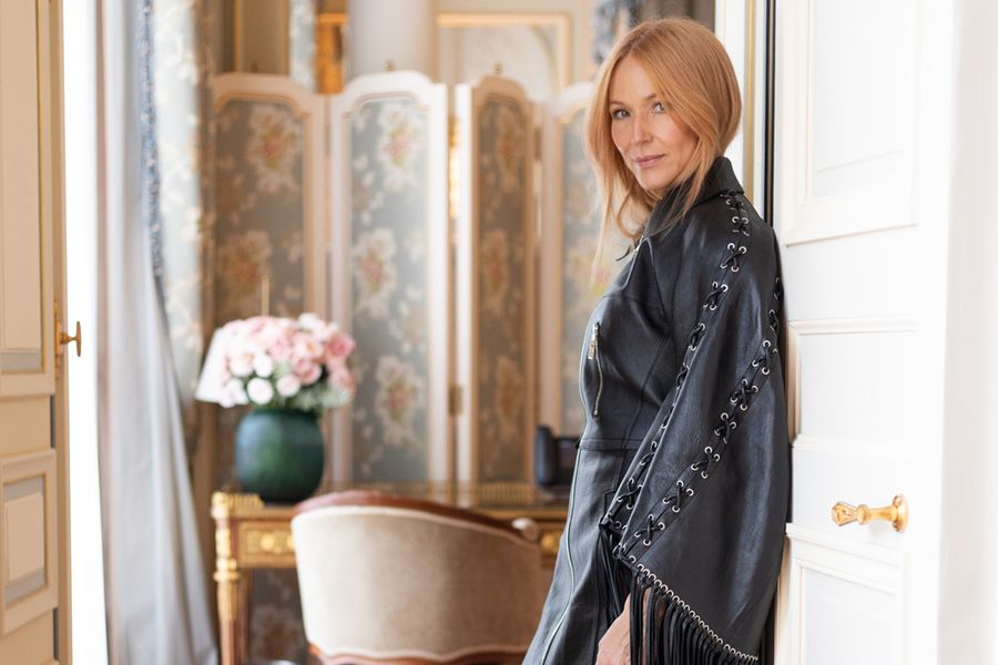 Singer/songwriter Jewel in black leather dress