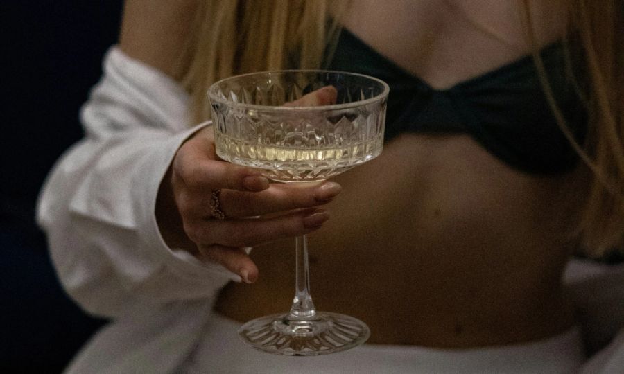 woman holding a champagne glass