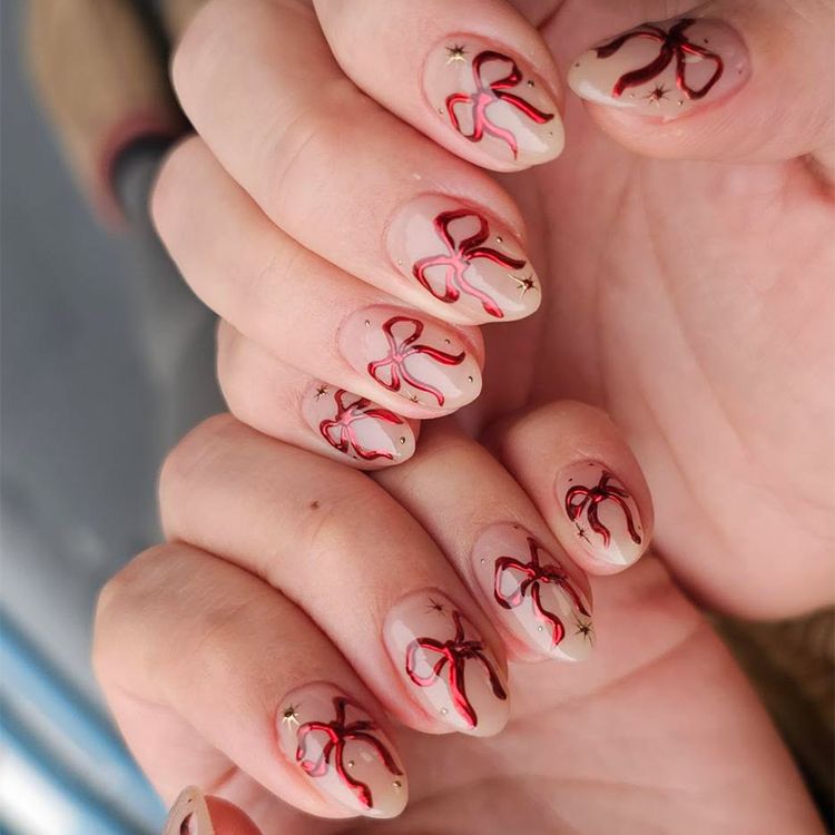 Demure Red Chrome Bow Nails