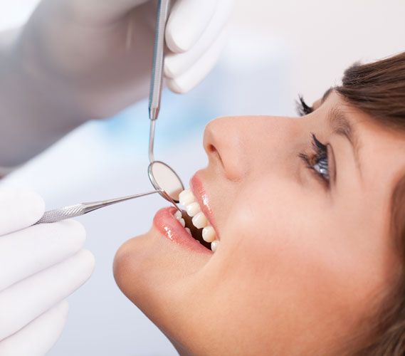 The solution: Regular cleanings and bonding or veneers