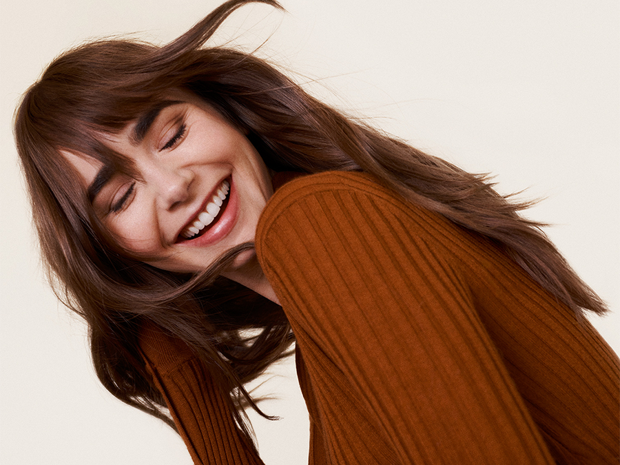 Lily Collins Reveals Her Go-To Texture Spray For Voluminous Hair