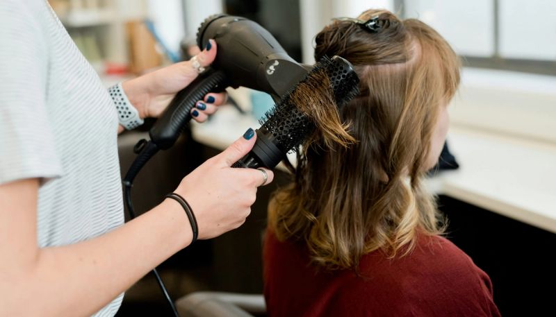 woman getting her hair done