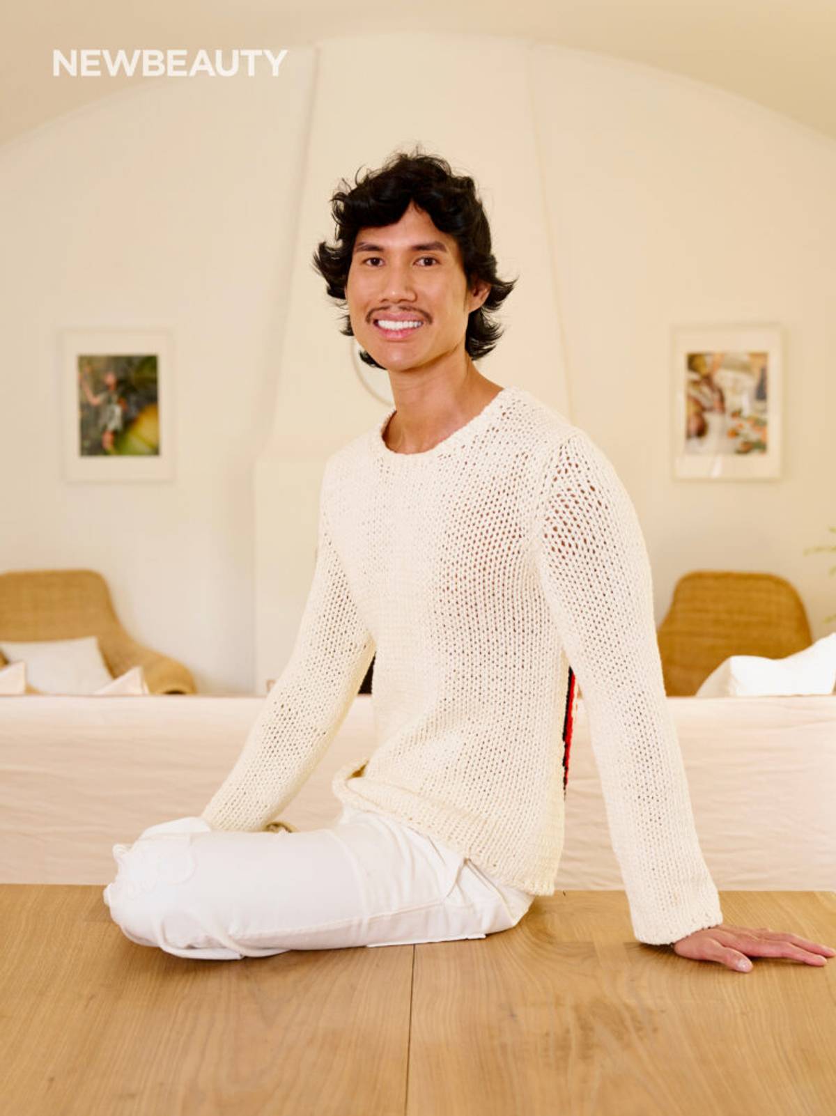 Patrick Ta in white sweater