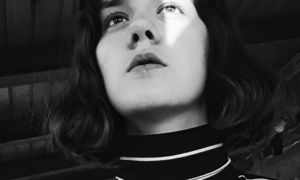 black and white photo of woman's jawline