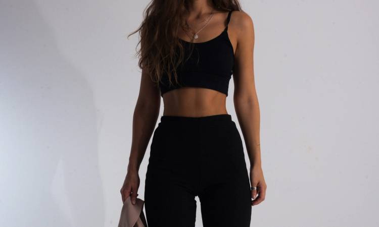 black and white photo of woman's waist area