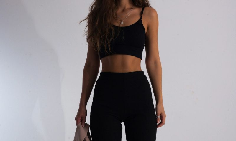 black and white photo of woman's waist area