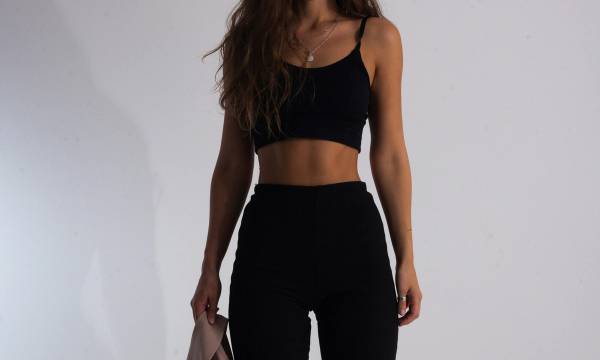 black and white photo of woman's waist area