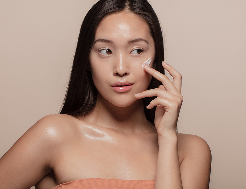 woman with cream on face