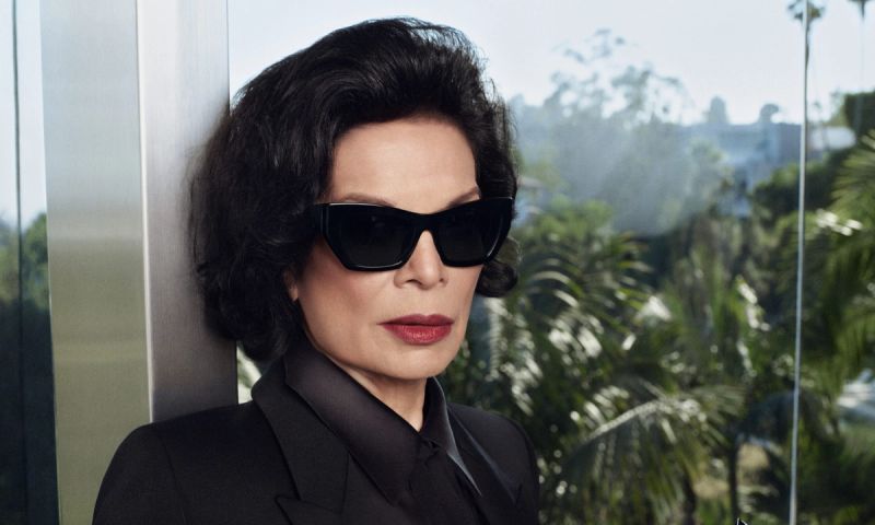 Bianca Jagger posing in sunglasses