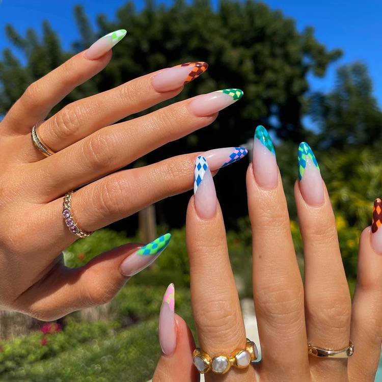 Kylie Jenner’s colorful checkerboard French-tip nails by celebrity manicurist Chaun Legend.
