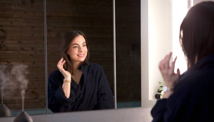 Woman looking in the mirror