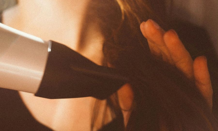 close up of hair dryer drying hair
