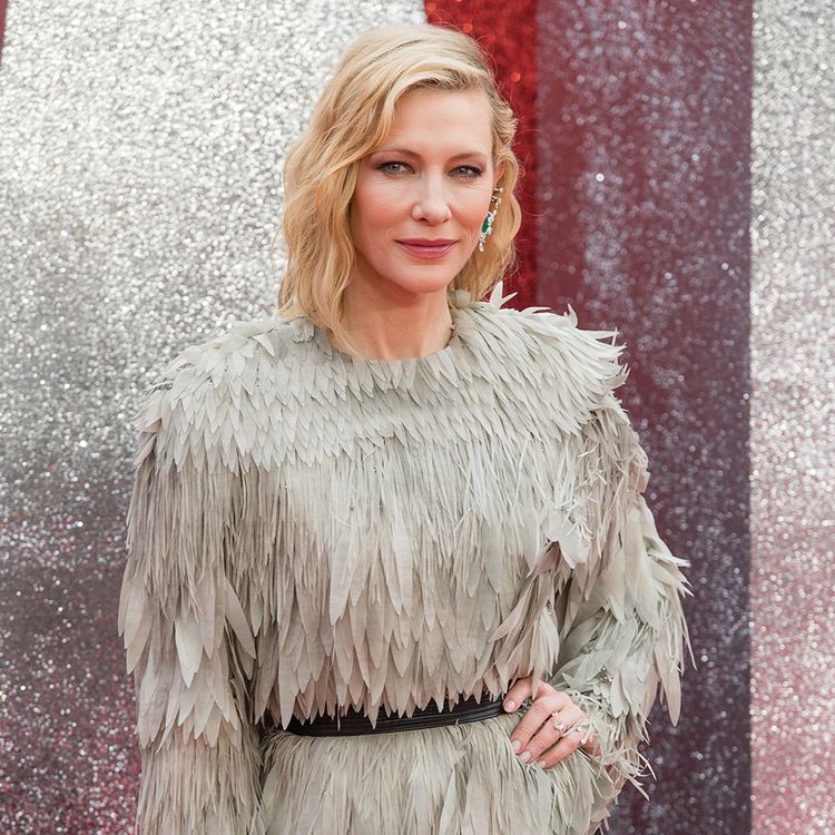 Cate Blanchett attends the 'Ocean's 8' in gray feather top