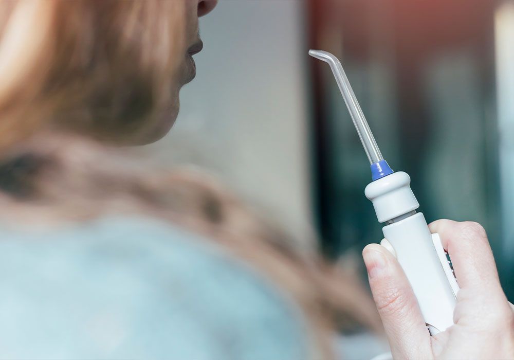 Do Water Flossers Replace Manual Flossing?