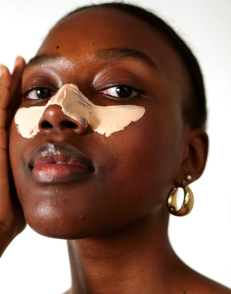 byroe peach clay mask on face