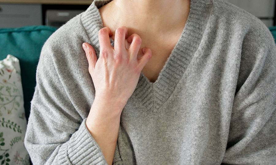 Scratching neck, chest