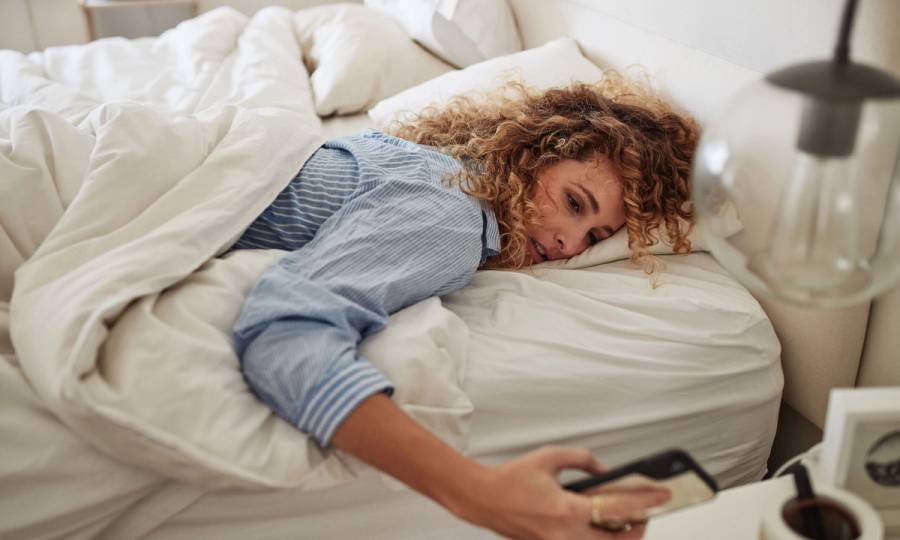 woman waking up in bed