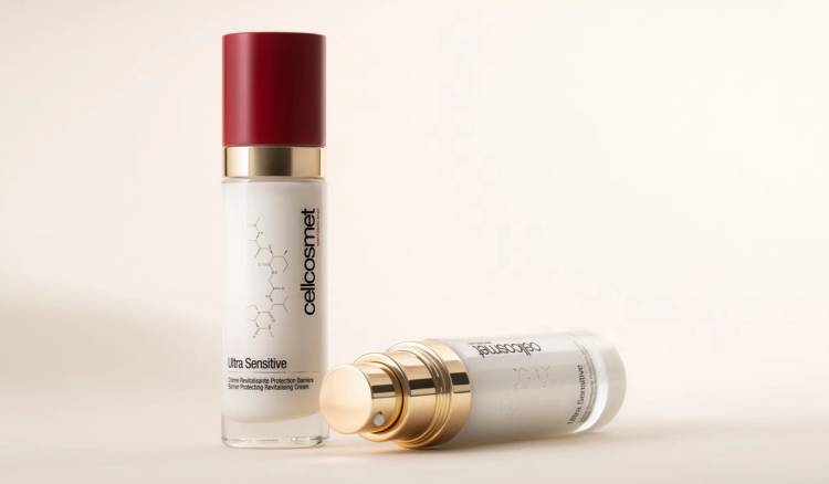 Two bottles of Cellcosmet Ultra Sensitive Barrier Protecting Revitalising Cream on a cream background